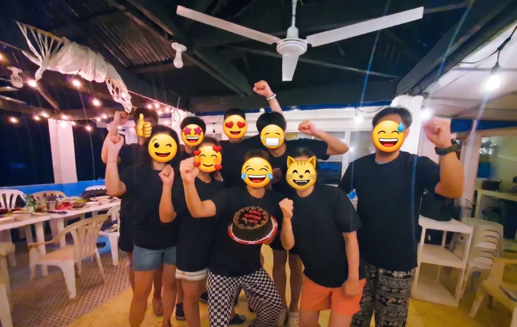 Group photo of a dive team celebrating after completing fun diving in Cebu — Passion Dive