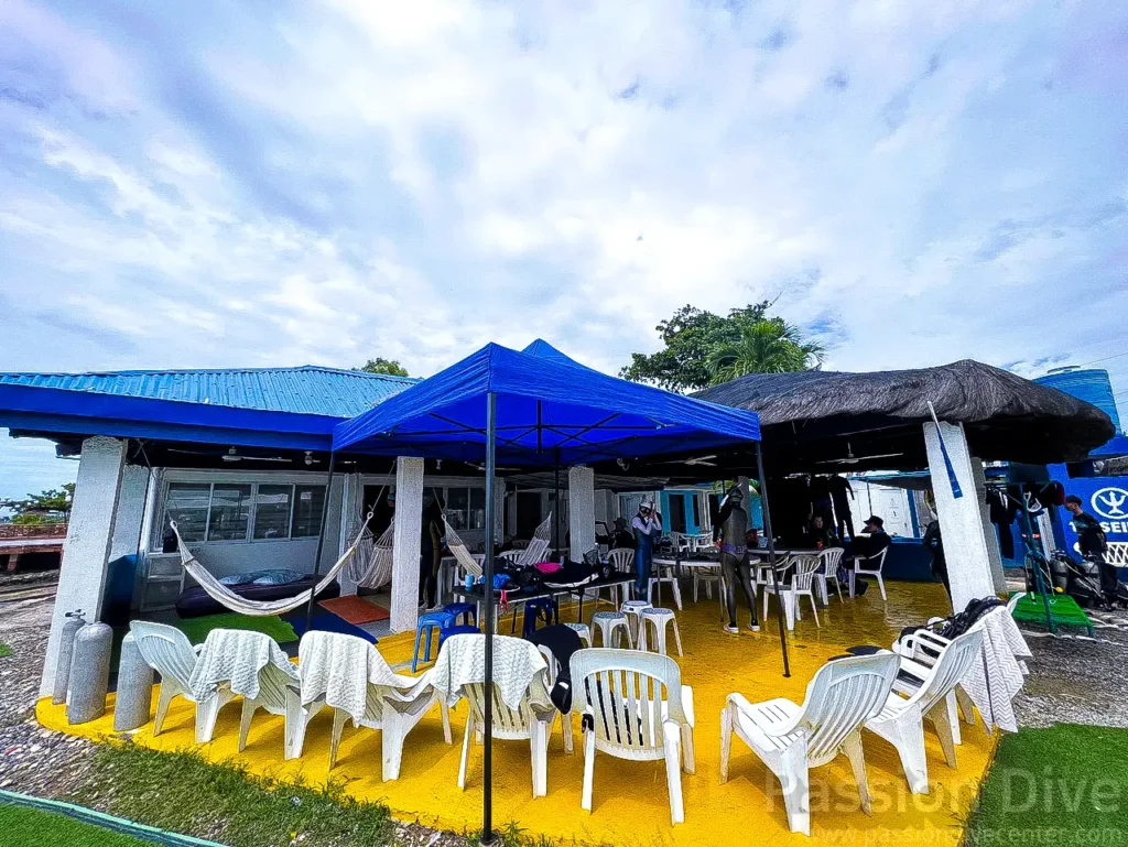 The painted yellow floor of Passion Dive center in Cebu before the artificial turf renovation.